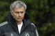 Chelsea manager Jose Mourinho arrives for a training session at Cobham in England, Tuesday, April 29, 2014. Chelsea will play a Champions League semifinal second leg soccer match against Atletico Madrid on Wednesday. (AP Photo/Kirsty Wigglesworth)