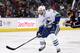 Vancouver's Ryan Kesler moves the puck against Columbus during the first period of an NHL hockey game Sunday, Oct. 20, 2013, in Columbus, Ohio. (AP Photo/ Mike Munden)