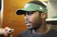 New York Jets NFL football quarterback Michael Vick speaks to the media Thursday, May 22, 2014, in Florham Park, N.J. (AP Photo/Bill Kostroun)