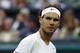 Rafael Nadal of Spain celebrates a point against Mikhail Kukushkin of Kazakhstan during their match at the All England Lawn Tennis Championships in Wimbledon, London, Saturday, June 28, 2014. (AP Photo/Ben Curtis)