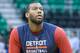 Mar 24, 2014; Salt Lake City, UT, USA; Detroit Pistons forward Greg Monroe (10) warms up prior to the game against the Utah Jazz at EnergySolutions Arena. Mandatory Credit: Russ Isabella-USA TODAY Sports