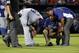 Aug 13, 2014; Atlanta, GA, USA; Los Angeles Dodgers starting pitcher Hyun-Jin Ryu (99) reacts after injuring himself in the sixth inning of their game against the Atlanta Braves at Turner Field. Mandatory Credit: Jason Getz-USA TODAY Sports