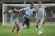 Newcastle United’s Jack Colback, right, controls the ball as Emmanuel Riviere holds back Sydney FC’s Bernie Ibini-Isei, center, during the first match of the Football United Tour at Forsyth Barr Stadium, Dunedin, New Zealand, Tuesday, July 22, 2014. (AP Photo/SNPA, Ross Setford) NEW ZEALAND OUT