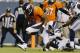 Denver Broncos wide receiver Jordan Norwood (11) scores a touchdown as Seattle Seahawks' Terrell Thomas (21) defends during the second half of an NFL preseason football game, Thursday, Aug. 7, 2014, in Denver. (AP Photo/Joe Mahoney)