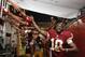 Washington Redskins quarterback Robert Griffin III reaches for fans' hands as he leaves the field after an NFL football preseason game against the New England Patriots in Landover, Md., Thursday, Aug. 7, 2014. The Redskins defeated the Patriots 23-6. (AP Photo/Alex Brandon)