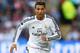 CARDIFF, WALES - AUGUST 12: Cristiano Ronaldo of Real Madrid runs with the ball during the UEFA Super Cup between Real Madrid and Sevilla FC at Cardiff City Stadium on August 12, 2014 in Cardiff, Wales. (Photo by Clive Mason/Getty Images)