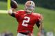 Cleveland Browns quarterback Johnny Manziel passes during practice at NFL football training camp in Berea, Ohio Tuesday, Aug. 12, 2014. (AP Photo/Mark Duncan)