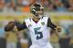 Jacksonville Jaguars quarterback Blake Bortles throws a pass against the Tampa Bay Buccaneers during the first half of an NFL preseason football game in Jacksonville, Fla., Friday, Aug. 8, 2014. (AP Photo/Stephen B. Morton)