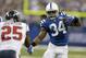 Indianapolis Colts running back Trent Richardson, right, tries to avoid the tackle of Houston Texans cornerback Kareem Jackson on his way to an 18-yard gain on a catch during the first half of an NFL football game in Indianapolis, Sunday, Dec. 15, 2013. (AP Photo/Darron Cummings)