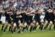 New Zealand All Blacks perform the haka, a traditional Maori challenge, before their rugby friendly match against Japan in Tokyo, Saturday, Nov. 2, 2013. (AP Photo/Koji Sasahara)