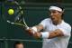 Rafael Nadal of Spain plays a return to Nick Kyrgios of Australia during their men's singles match at the All England Lawn Tennis Championships in Wimbledon, London, Tuesday, July 1, 2014. (AP Photo/Ben Curtis)