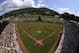 In this photo made with a fisheye lens Lynnwood, Washington pitcher Ian Michael delivers the first pitch of a baseball game to Chicago's Pierce Jones during United States pool play in Lamade Stadium at the Little League World Series tournament in South Williamsport, Pa., Thursday, Aug. 14, 2014. Pierce opened the game with a solo home run and Chicago won 12-2. (AP Photo/Gene J. Puskar)