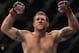 Ryan Bader celebrates after beating Jason Brilz by knockout in the first round of a UFC 139 Mixed Martial Arts light heavyweight bout in San Jose, Calif., Saturday, Nov. 19, 2011. (AP Photo/Jeff Chiu)