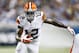 Cleveland Browns wide receiver Josh Gordon (12) runs the ball against the Detroit Lions during a preseason NFL football game at Ford Field in Detroit, Saturday, Aug. 9, 2014. (AP Photo/Rick Osentoski)