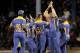PORT OF SPAIN, TRINIDAD AND TOBAGO - AUGUST 23: Kieron Pollard (R) of Barbados Tridents celebrates Jamaica Tallawahs Chris Gayle out during the Second Semi Final of the Caribbean Premier League between Barbados Tridents v Jamaica Tallawahs at Queens Park Oval on August 23, 2013 in Port of Spain, Trinidad and Tobago. (Photo by Randy Brooks/LatinContent/Getty Images)