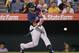 Boston Red Sox's Yoenis Cespedes hits a two-run double during the third inning of a baseball game against the Los Angeles Angels, Friday, Aug. 8, 2014, in Anaheim, Calif. (AP Photo/Jae C. Hong)