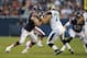 Chicago Bears defensive end Jared Allen (69) tries to move around Jacksonville Jaguars tackle Luke Joeckel (76) during the first half of an NFL preseason football game in Chicago, Thursday, Aug. 14, 2014. (AP Photo/Charles Rex Arbogast)