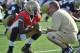 FILE - In this Aug. 9, 2014, file photo, Notre Dame coach Brian Kelly, right, talks with quarterback Everett Golson during practice in South Bend, Ind. Golson has reclaimed the job as Notre Dame's starting quarterback after being suspended last semester for academic impropriety. Coach Brian Kelly on Wednesday, Aug. 13, 2014, said Golson would start against Rice on Aug. 30 and said he hopes he will be the starter for the entire season. (AP Photo/Joe Raymond, FILE)