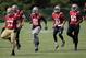 San Francisco 49ers wide receiver Anquan Boldin (81) warms up with guard Daniel Kilgore, from left, quarterback McLeod Bethel-Thompson, wide receiver David Reed and tight end Kevin Greene during an NFL football training camp practice, Monday, Aug. 11, 2014, in Owings Mills, Md. (AP Photo/Patrick Semansky)