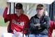 Arizona Diamondbacks manager Kirk Gibson, left, and general manager Kevin Towers ride to the practice fields during the teams' first baseball spring training workout, Friday, Feb. 7, 2014, in Scottsdale, Ariz. (AP Photo/Matt York)