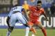 Liverpool's Raheem Sterling (31) is defended by Manchester City's Dedryck Boyata (38) in the second half of a Guinness International Champions Cup soccer tournament match Wednesday, July 30, 2014, in New York. Liverpool won the game 3-2 in a penalty kick shootout. (AP Photo/Frank Franklin II)