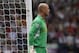 Liverpool's goalkeeper Pepe Reina plays against West Bromwich Albion during their English Premier League soccer match at the Hawthorns, West Bromwich, England, Saturday, Aug. 18, 2012. (AP Photo/Sang Tan)