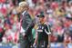 STOKE ON TRENT, ENGLAND - AUGUST 26: Tony Pulis (R) the Stoke City manager looks on with Arsene Wenger, the Arsenal manager during the Barclays Premier League match between Stoke City and Arsenal at the Britannia Stadium on August 26, 2012 in Stoke on Trent, England. (Photo by David Rogers/Getty Images)