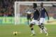 Colombia's Carlos Sanchez, left, and Cristian Zapata, rear right, play the ball during the international friendly soccer match between Netherlands and Colombia at ArenA stadium in Amsterdam, Netherlands, Tuesday Nov. 19, 2013. (AP Photo/Peter Dejong)