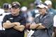 Philadelphia Eagles head coach Chip Kelly, left, and New England Patriots head coach Bill Belichick, meet at a joint workout during NFL football training camp, Philadelphia, Wednesday, Aug. 7, 2013. (AP Photo/Matt Rourke)