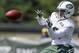 New York Jets wide receiver Jalen Saunders catches a pass during the Jets NFL football training camp Thursday, July 24, 2014, in Cortland, N.Y. (AP Photo)