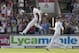 England's Chris Jordan, center, celebrates after taking India's last wicket, that of Pankaj Singh, bowled first ball, at Old Trafford cricket ground on the third day of the fourth test match of their five match series against England, in Manchester, England, Saturday, Aug. 9, 2014. England won the game by an innings and 54 runs. (AP Photo/Jon Super)