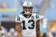 Carolina Panthers wide receiver Kelvin Benjamin (13) walks across the field prior to a preseason NFL football game Friday, Aug. 8, 2014, in Charlotte, N.C. (AP Photo/Mike McCarn)