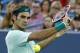 Roger Federer, from Switzerland, returns a volley to Gael Monfils, from France, during a match at the Western & Southern Open tennis tournament, Thursday, Aug. 14, 2014, in Mason, Ohio. (AP Photo/David Kohl)