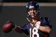 Denver Broncos' Peyton Manning runs a passing drill during the final day of NFL football training camp on Friday, Aug. 15, 2014, in Englewood, Colo. (AP Photo/Jack Dempsey)