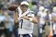 San Diego Chargers quarterback Philip Rivers passes during warmups before a preseason NFL football game against the Seattle Seahawks, Friday, Aug. 15, 2014, in Seattle. (AP Photo/Stephen Brashear)