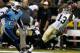 NEW ORLEANS, LA - AUGUST 15: Joe Morgan #13 of the New Orleans Saints catches a pass in front of Coty Sensabaugh #24 of the Tennessee Titans during a preseason game between the New Orleans Saints and the Tennessee Titans at Mercedes-Benz Superdome on August 15, 2014 in New Orleans, Louisiana. (Photo by Sean Gardner/Getty Images)