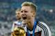 RIO DE JANEIRO, BRAZIL - JULY 13: Andre Schuerrle celebrates with the World Cup trophy after defeating Argentina 1-0 in extra time during the 2014 FIFA World Cup Brazil Final match between Germany and Argentina at Maracana on July 13, 2014 in Rio de Janeiro, Brazil. (Photo by Matthias Hangst/Getty Images)