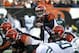 Cincinnati Bengals quarterback Andy Dalton (14) calls out during an NFL football game against the New York Jets, Sunday, Oct. 27, 2013, in Cincinnati. (AP Photo/David Kohl)