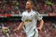 MANCHESTER, ENGLAND - AUGUST 16: Gylfi Sigurdsson of Swansea City celebrates scoring his team's second goal during the Barclays Premier League match between Manchester United and Swansea City at Old Trafford on August 16, 2014 in Manchester, England. (Photo by Alex Livesey/Getty Images)