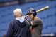 ST. PETERSBURG, FL - MAY 22: Third baseman Evan Longoria (R) of the Tampa Bay Rays speaks with manager Joe Maddon of the Tampa Bay Rays during batting practice before the start of a game against the Oakland Athletics on May 22, 2014 at Tropicana Field in St. Petersburg, Florida. (Photo by Brian Blanco/Getty Images)