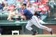 ARLINGTON, TX - JUNE 28: Joe Mauer #7 of the Minnesota Twins makes a base hit in the first inning against the Texas Rangers at Globe Life Park in Arlington on June 28, 2014 in Arlington, Texas. (Photo by Rick Yeatts/Getty Images)