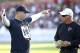 Houston Texans coach Bill O’Brien, left, talks with Atlanta Falcons coach Mike Smith, right, during an NFL football training camp practice Thursday, Aug. 14, 2014, in Houston. The Falcons are practicing with the Houston Texans before their preseason game Saturday. (AP Photo/David J. Phillip)