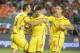 IMAGE DISTRIBUTED FOR GUINNESS INTERNATIONAL CHAMPIONS CUP - Liverpool's Steven Gerrard, center, celebrates with teammates, Rickie Lambert, left, and Jordan Henderson after he scored against Manchester United in the 2014 Guinness International Champions Cup Finals, on Monday, August 4, 2014 in Miami Gardens, FL. (Doug Murray/AP Images for Guinness International Champions Cup)