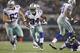 Dallas Cowboys running back Ryan Williams (34) carries the ball during the second half of an NFL preseason football game against the Baltimore Ravens Saturday, Aug. 16, 2014, in Arlington, Texas. (AP Photo/Matt Strasen)