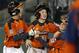 Cumberland's CJ Davock, center, celebrates his walkoff-double with teammates Addison Kopack, left, and Brendan Wright, right, in the sixth inning of a baseball game against Nashville at the Little League World Series tournament in South Williamsport, Pa., Saturday, Aug. 16, 2014. Cumberland won 8-7. (AP Photo/Gene J. Puskar)