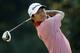 JOHNS CREEK, GA - AUGUST 16: Gunn Yang watches his tee shot on the ninth hole during the semi-final match of the U.S. Amateur Championship on August 16, 2014 at the Atlanta Athletic Club in Johns Creek, Georgia. (Photo by Butch Dill/Getty Images)