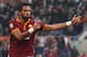 ROME, ITALY - DECEMBER 22: Mehdi Benatia of AS Roma celebrates after scoring the third team's goal during the Serie A match between AS Roma and Calcio Catania at Stadio Olimpico on December 22, 2013 in Rome, Italy. (Photo by Paolo Bruno/Getty Images)