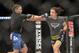 Aug 16, 2014; Bangor, ME, USA; Sara McMann (red gloves) fights Lauren Murphy (blue gloves) during a womens bantamweight bout in UFC Fight Night 47 at Cross Insurance Center. Mandatory Credit: Gregory J. Fisher-USA TODAY Sports