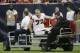 Atlanta Falcons' Sam Baker (72) leaves on a cart after he was injured during the second quarter of an NFL preseason football game against the Houston Texans, Saturday, Aug. 16, 2014, in Houston. (AP Photo/David J. Phillip)