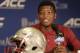 Florida State's Jameis Winston answers a question during a news conference at the Atlantic Coast Conference Football kickoff in Greensboro, N.C., Sunday, July 20, 2014. (AP Photo/Chuck Burton)